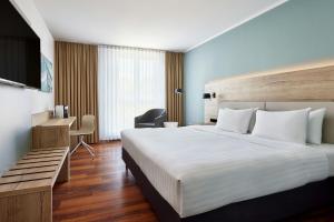 Postel nebo postele na pokoji v ubytování Courtyard by Marriott Dresden