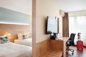 TV a/nebo společenská místnost v ubytování Courtyard by Marriott Dresden