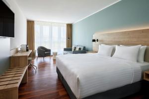 Postel nebo postele na pokoji v ubytování Courtyard by Marriott Dresden