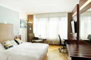 TV a/nebo společenská místnost v ubytování Courtyard by Marriott Dresden
