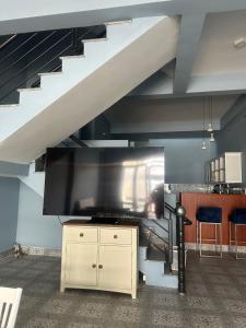 A television and/or entertainment centre at Vung Tau Villa mini sát biển - Gitico Homestay