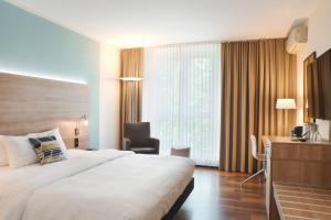 Postel nebo postele na pokoji v ubytování Courtyard by Marriott Dresden