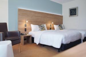 Postel nebo postele na pokoji v ubytování Courtyard by Marriott Dresden