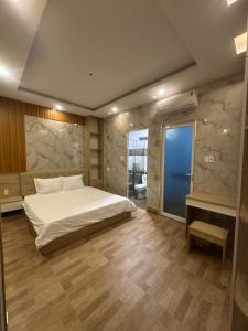 Postel nebo postele na pokoji v ubytování Vung Tau Villa mini sát biển - Gitico Homestay