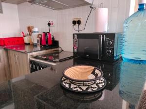 Kuchyň nebo kuchyňský kout v ubytování Park Place Hotel