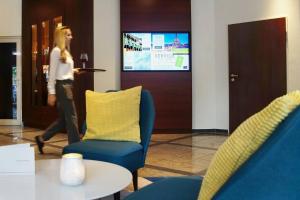TV a/nebo společenská místnost v ubytování Courtyard by Marriott Dresden