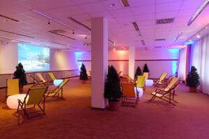 TV a/nebo společenská místnost v ubytování Courtyard by Marriott Dresden
