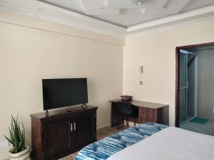 TV a/nebo společenská místnost v ubytování Park Place Hotel
