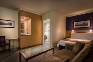Postel nebo postele na pokoji v ubytování BEST WESTERN PLUS Travel Inn