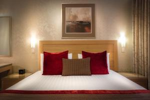 Postel nebo postele na pokoji v ubytování BEST WESTERN PLUS Travel Inn
