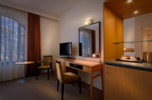 Kuchyň nebo kuchyňský kout v ubytování BEST WESTERN PLUS Travel Inn