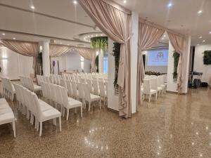 TV a/nebo společenská místnost v ubytování Appia Antica Hotel