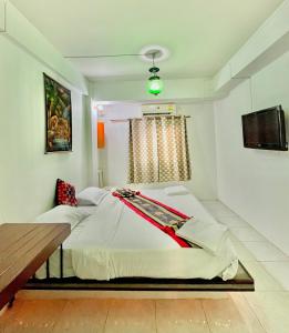 Postel nebo postele na pokoji v ubytování Sea Beach Paradise