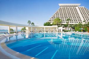Bazén v ubytování Sheraton Grand Doha Resort & Convention Hotel nebo v jeho okolí