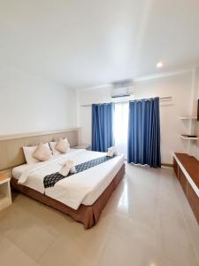 Ένα ή περισσότερα κρεβάτια σε δωμάτιο στο Bualinn Resort +98 φωτογραφίες