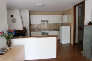 Kuchyň nebo kuchyňský kout v ubytování B&B Casa Elena Room and Apartments with parking