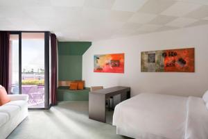 Un ou plusieurs lits dans un hébergement de l'établissement Four Points by Sheraton Catania Hotel