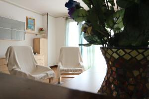 Posezení v ubytování B&B Casa Elena Room and Apartments with parking
