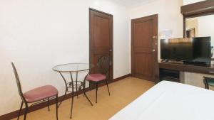 Kuchyň nebo kuchyňský kout v ubytování Bliss Hotel Dau