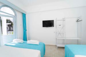Postel nebo postele na pokoji v ubytování Kemer Royal Beach