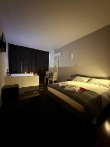 Postel nebo postele na pokoji v ubytování Panta Rei Camere di Charme e Spa