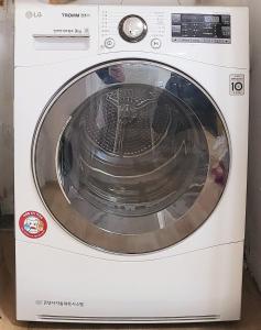 a white washing machine with its door open at STAY at Miasageori #Up to 6 people #Subway 2 min #Airport bus 2 min #Dongdaemun 10 min #Myeongdong 15 min #Seoul Station 20 min #Gyeongbokgung Palace, Bukchon Hanok Village, Seongsu, Hongdae 25 min #Itaewon 30 min #Gangnam 40 min in Seoul