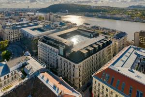 an overhead view of a city with a river and buildings at Dorothea Hotel, Budapest, Autograph Collection in Budapest
