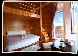 Voodi või voodid majutusasutuse 彩虹灣Rainbow Bay B&B toas