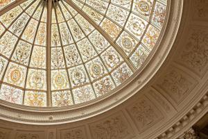 a ceiling with a glass dome in a building at Threadneedles, Autograph Collection in London +56 photos