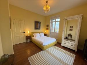 Postel nebo postele na pokoji v ubytování Château de Ligny