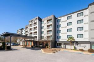 a rendering of the front of a hotel with a parking lot at Courtyard Greenville-Spartanburg Airport in Greenville
