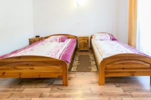 Posteľ alebo postele v izbe v ubytovaní Ceper Pokoje Gościnne