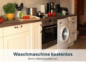 Küche/Küchenzeile in der Unterkunft Ferienhaus mit Reetdach Gerdi