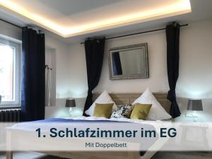 Ein Bett oder Betten in einem Zimmer der Unterkunft Ferienhaus mit Reetdach Gerdi