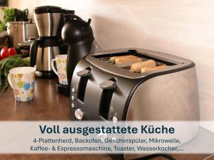 Kaffee-/Teezubehör in der Unterkunft Ferienhaus mit Reetdach Gerdi