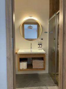 Kúpeľňa v ubytovaní ApartHouse Apartamenty w Białce Tatrzańskiej + 2 fotografie