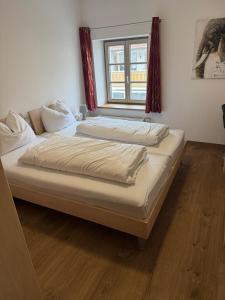 Postel nebo postele na pokoji v ubytování Hotel Restaurant Zum Wendelwirt