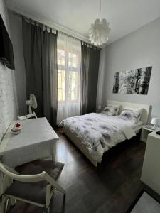 Ένα ή περισσότερα κρεβάτια σε δωμάτιο στο AMETYST Apartment