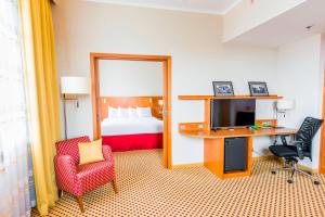 Μια τηλεόραση ή/και κέντρο ψυχαγωγίας στο Courtyard by Marriott Pilsen