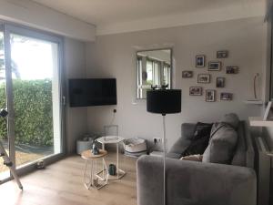 TV a/nebo společenská místnost v ubytování appartement vue sur mer