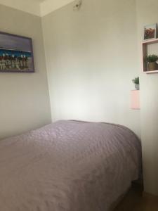 Postel nebo postele na pokoji v ubytování appartement vue sur mer