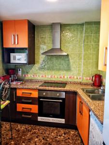 A kitchen or kitchenette at Villa caseta blanca de Moraira