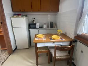 A kitchen or kitchenette at Villino Carla Még 37 kép