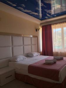 Postel nebo postele na pokoji v ubytování Goris Hotel