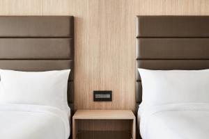 Postel nebo postele na pokoji v ubytování AC Hotel by Marriott Dallas Frisco