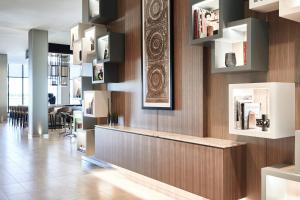 TV a/nebo společenská místnost v ubytování AC Hotel by Marriott Dallas Frisco