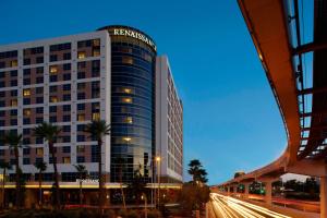 a tall building with a sign on the side of it at Renaissance Las Vegas Hotel in Las Vegas