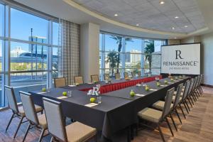 a conference room with a long table and chairs at Renaissance Las Vegas Hotel in Las Vegas +37 photos