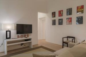 A television and/or entertainment centre at Luxury apt in the heart of city out of ZTL