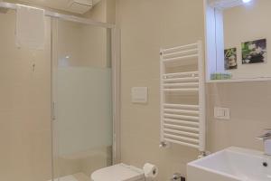 A bathroom at Luxury apt in the heart of city out of ZTL